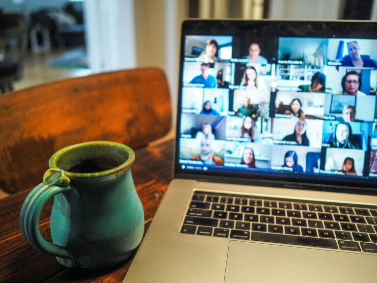 Computer and coffee mug